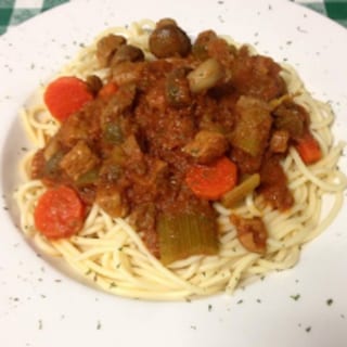 Veal Scallopini Over Spaghetti